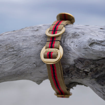 subwooferdog-beige-and-red-stripe-collar-with-brass-hardware-on-driftwood