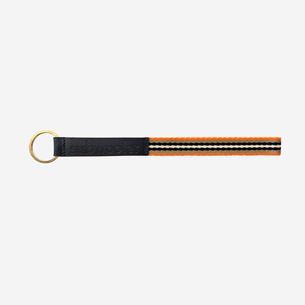 subwooferdog-key-ring-with-black-stamped-leather-tab-orange-black-cream-and-beige-striped-webbing