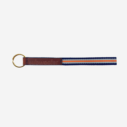 subwooferdog-key-ring-with-brown-leather-stamped-tab-and-orange-navy-and-silver-striped-webbing