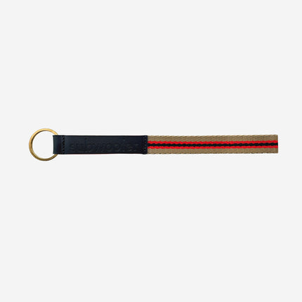 subwooferdog-keyring-with-sand-and-red-stripe-handle-and-black-leather-stamped-tab